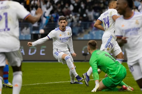 Real Madrid's Federico Valverde celebrates after a goal during the Spanish Super Cup semi final soccer match between Barcelona and Real Madrid at King Fahd stadium in Riyadh, Saudi Arabia, Thursday, Jan. 13, 2022. (AP Photo/Hassan Ammar)