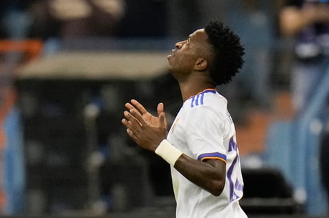 Real Madrid's Vinicius Junior celebrates after he scored during the Spanish Super Cup semi final soccer match between Barcelona and Real Madrid at King Fahd stadium in Riyadh, Saudi Arabia, Wednesday, Jan. 12, 2022. (AP Photo/Hassan Ammar)