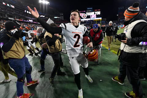 Cincinnati Bengals kicker Evan McPherson (2) celebrates his game-winning field goal against the Tennessee Titans after an NFL divisional round playoff football game, Saturday, Jan. 22, 2022, in Nashville, Tenn. The Cincinnati Bengals won 19-16. (AP Photo/Mark Zaleski)
