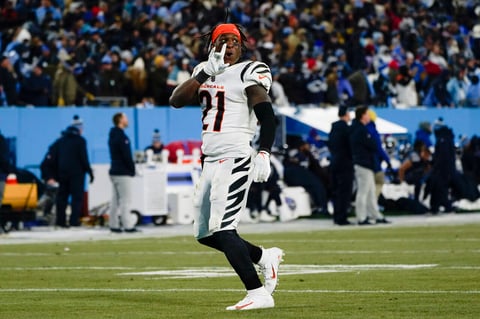 Cincinnati Bengals cornerback Mike Hilton (21) celebrates a win over the Tennessee Titans after an NFL divisional round playoff football game, Saturday, Jan. 22, 2022, in Nashville, Tenn. The Cincinnati Bengals won 19-16. (AP Photo/Mark Humphrey)