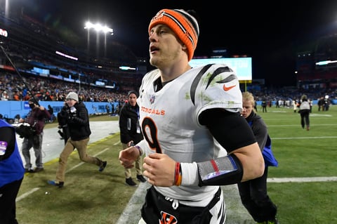 Cincinnati Bengals quarterback Joe Burrow leaves the field after an NFL divisional round playoff football game against the Tennessee Titans, Saturday, Jan. 22, 2022, in Nashville, Tenn. The Cincinnati Bengals won 19-16. (AP Photo/Mark Zaleski)