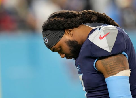 Tennessee Titans running back D'onta Foreman walks off the field after the team's 19-16 loss to the Cincinnati Bengals in an NFL AFC divisional playoff football game Saturday, Jan. 22, 2021, in Nashville, Tenn. (George Walker IV/The Tennessean via AP)