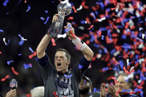 FILE - New England Patriots' Tom Brady raises the Vince Lombardi Trophy after defeating the Atlanta Falcons in overtime at the NFL Super Bowl 51 football game, in Houston, Feb. 5, 2017. Tom Brady has retired after winning seven Super Bowls and setting numerous passing records in an unprecedented 22-year-career. He made the announcement, Tuesday, Feb. 1, 2022, in a long post on Instagram. (AP Photo/Darron Cummings, File)