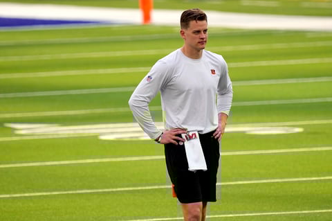 Cincinnati Bengals quarterback Joe Burrow looks at the field before the NFL Super Bowl 56 football game against the Los Angeles Rams Sunday, Feb. 13, 2022, in Inglewood, Calif. (AP Photo/Ted S. Warren)