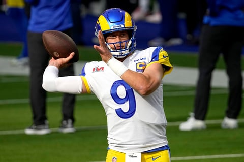 Los Angeles Rams quarterback Matthew Stafford (9) warms up before the NFL Super Bowl 56 football game between the Los Angeles Rams and the Cincinnati Bengals Sunday, Feb. 13, 2022, in Inglewood, Calif. (AP Photo/Tony Gutierrez)