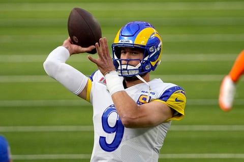 Los Angeles Rams quarterback Matthew Stafford (9) warms up before the NFL Super Bowl 56 football game between the Los Angeles Rams and the Cincinnati Bengals, Sunday, Feb. 13, 2022, in Inglewood, Calif. (AP Photo/Tony Gutierrez)