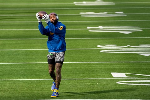Los Angeles Rams wide receiver Odell Beckham Jr. warms up before the NFL Super Bowl 56 football game against the Cincinnati Bengals, Sunday, Feb. 13, 2022, in Inglewood, Calif. (AP Photo/Tony Gutierrez)