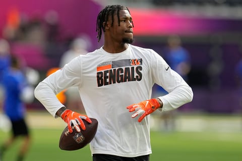 Cincinnati Bengals wide receiver Tee Higgins warms up before the NFL Super Bowl 56 football game against the Los Angeles Rams, Sunday, Feb. 13, 2022, in Inglewood, Calif. (AP Photo/Marcio Jose Sanchez)