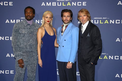 Yahya Abdul-Mateen II, from left, Eiza Gonzalez, Jake Gyllenhaal and Michael Bay pose for photographers upon arrival at the premiere of the film 'Ambulance' in London Wednesday, March 23, 2022. (Photo by Joel C Ryan/Invision/AP)