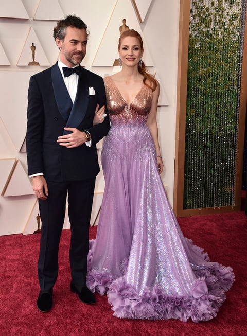 Gian Luca Passi de Preposulo, left, and Jessica Chastain arrive at the Oscars on Sunday, March 27, 2022, at the Dolby Theatre in Los Angeles. (Photo by Jordan Strauss/Invision/AP)
