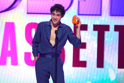 Joshua Bassett accepts the award for favorite male TV star at the Kids Choice Awards on Saturday, April 9, 2022, at the Barker Hangar in Santa Monica, Calif. (AP Photo/Chris Pizzello)