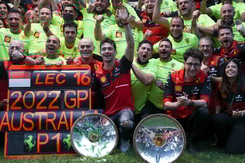 Ferrari driver Charles Leclerc, centre, of Monaco celebrates with his team after winning the Australian Formula One Grand Prix in Melbourne, Australia, Sunday, April 10, 2022. (AP Photo/Asanka Brendon Ratnayake)
