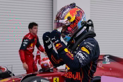 Red Bull driver Max Verstappen of the Netherlands celebrates after winning the Formula One Miami Grand Prix auto race over second placer finisher Ferrari driver Charles Leclerc of Monaco, left, at the Miami International Autodrome, Sunday, May 8, 2022, in Miami Gardens, Fla. (AP Photo/Darron Cummings)