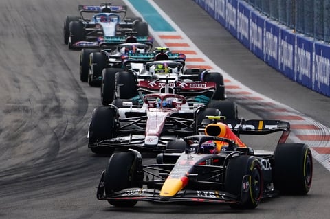 Miami Gardens (United States), 08/05/2022.- Mexican Formula One driver Sergio Perez of Red Bull Racing (R) fights for position during the Formula One Grand Prix of Miami at the Miami International Autodrome in Miami Gardens, USA, 08 May 2022. (Fórmula Uno, Estados Unidos, Roma) EFE/EPA/SHAWN THEW