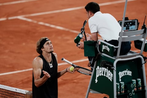 Germany's Alexander Zverev argues with chief umpire Renaud Lichtenstein of France during the semifinal match against Spain's Rafael Nadal at the French Open tennis tournament in Roland Garros stadium in Paris, France, Friday, June 3, 2022. (AP Photo/Thibault Camus)