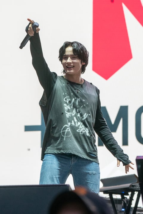 Huening Kai of Tomorrow X Together performs on Day 3 of the Lollapalooza Music Festival on Saturday, July 30, 2022, at Grant Park in Chicago. (Photo by Amy Harris/Invision/AP)