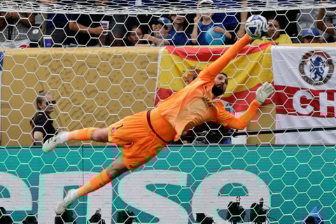 Paris Saint-Germain's goalkeeper Gianluigi Donnarumma saves the ball during the Club World Cup final soccer match between Chelsea and PSG in East Rutherford, N.J., Sunday, July 13, 2025. (AP Photo/Adam Hunger)