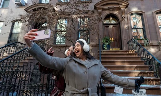 Turistas frente a la casa donde se grabó 'Sex and the City'. Foto: EFE