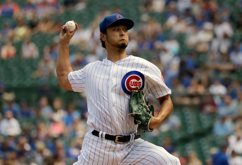 El japonés Yu Darvish no permitió carreras en seis entradas de trabajo, y logró su primera victoria en Wrigley Field. (AP)