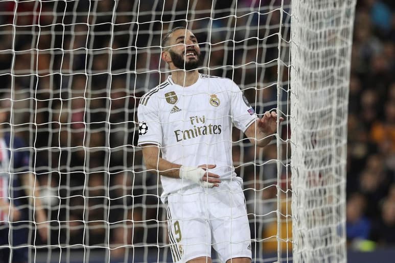 Karim Benzemá anotó un doblete en el partido con el PSG en la UEFA Champions League. (EFE)