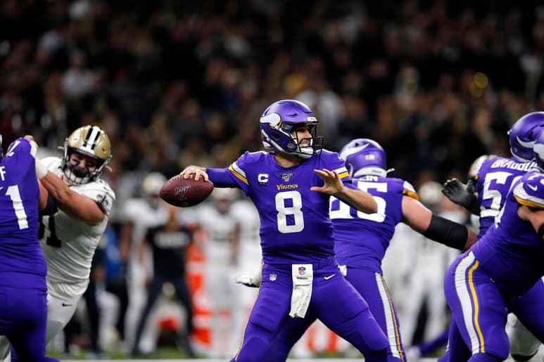 Kirk Cousins lanzó para 242 yardas y una anotación ante los Santos. (AP)