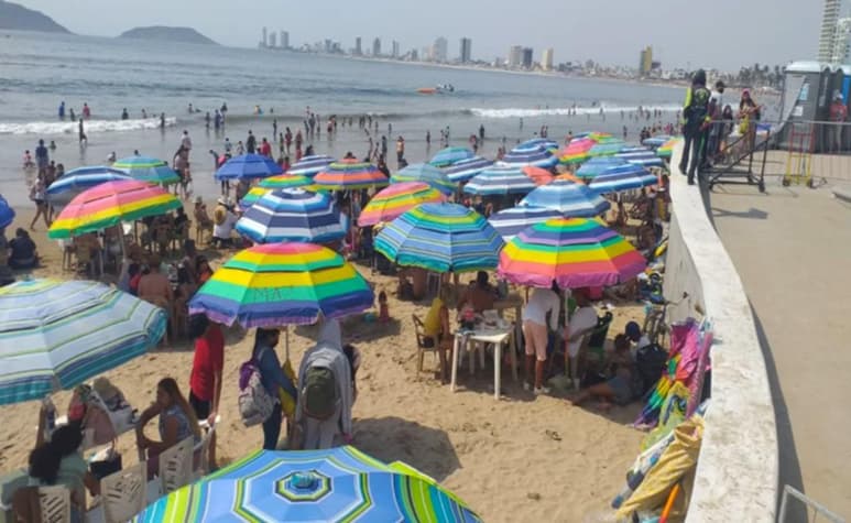 En cuatro municipios del estado, el número de visitantes superó la afluencia permitida por control sanitario, por lo que las autoridades de Protección Civil cerraron los accesos a algunas playas, anunció en su cuenta de redes sociales el secretario de Seguridad Pública del estado, Cristóbal Castañeda Camarillo. (ESPECIAL)