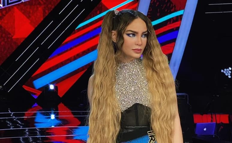 Belinda respondió a un internauta que la acusó de no saber quién es la banda Iron Maiden, luego de lucir un diseño del grupo en su vestimenta. (TWITTER).