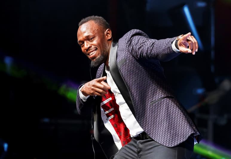 El velocista Usain Bolt dijo que siempre soñó con ser nombrado junto a leyendas como Maradona, Pelé o Muhammad Ali. (ARCHIVO)