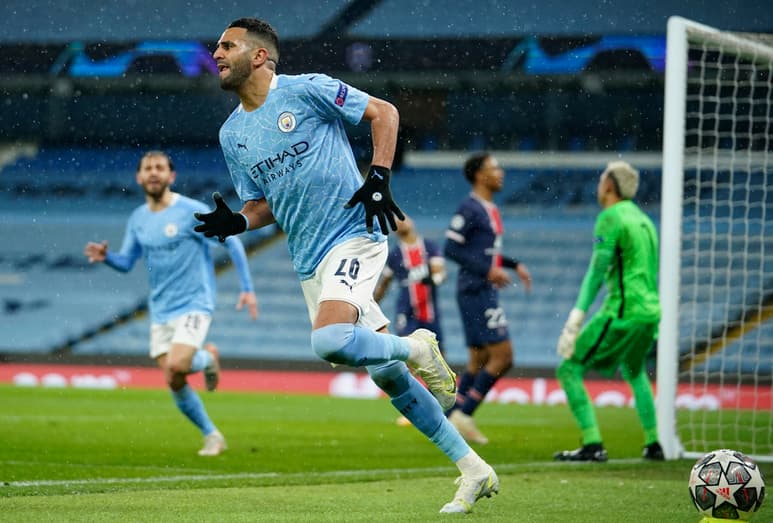 Riyad Mahrez celebra tras anotar el segundo gol del Manchester City en la victoria 2-0 ante el Paris Saint Germain por la semifinal de la Liga de Campeones, el martes 4 de mayo de 2021, en Manchester. (AP Foto/Dave Thompson)