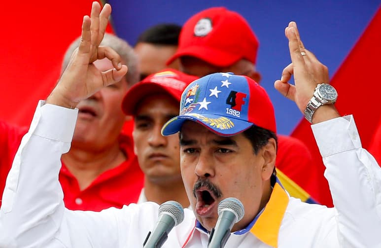 El presidente de Venezuela, Nicolás Maduro, habla durante un mitin antiimperialista por la paz, en Caracas, Venezuela, el sábado 23 de marzo de 2019. (AP Foto/Natacha Pisarenko)