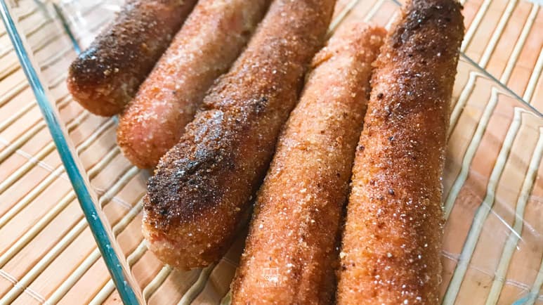 Salchichas empanizadas rellenas de queso