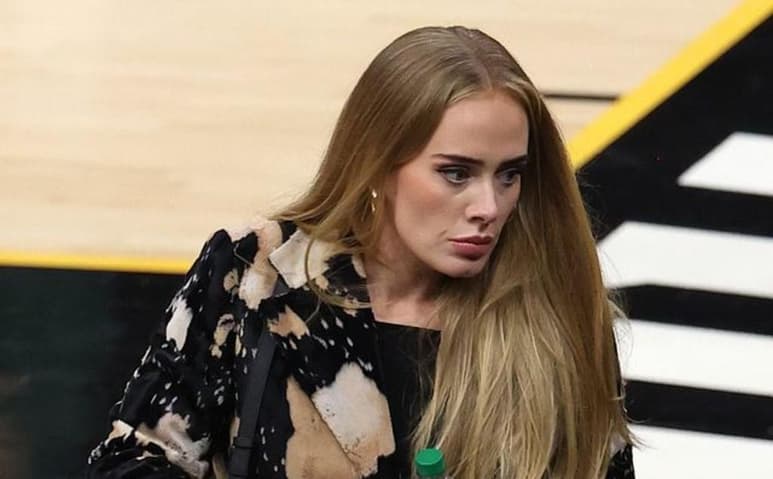 Belleza. Adele robó la atención debido a su aspecto al acudir a un partido de la NBA.
