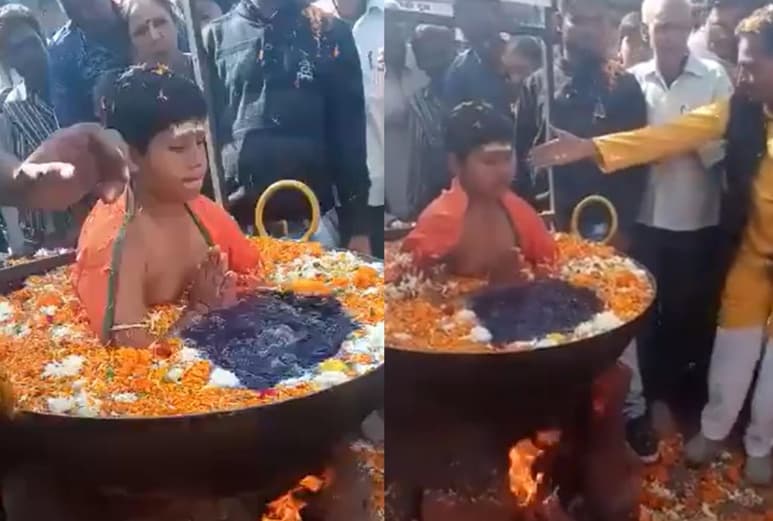 En el video se ve al niño posar tranquilamente entre el agua supuestamente hirviendo, rodeado de pétalos de flores (CAPTURA)