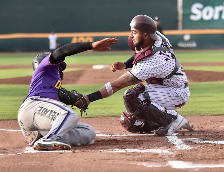 Los Dorados amenazaron en ocasiones al pitcheo Guinda, pero buenas jugadas a la defensiva lograron sostener la ventaja de los locales. (Foto: Ramón Sotomayor)
