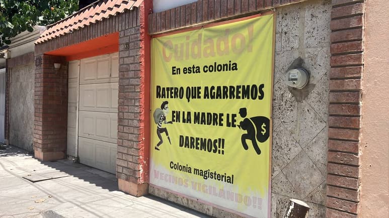 Cartel de los vecinos. (Guadalupe Miranda)