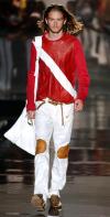 Cavalli fue calificado por la crítica como un dandy ocioso que se dedica a pasatiempos elitistas, como la hípica o la vela, y que para acudir a Saint Tropez o Palm Beach escoge la ligereza en pantalones y camisas de seda con motivos de flores y adornos de piel de leopardo.
