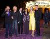 Los dos Beatles sobrevivientes, Paul McCartney y Ringo Starr, hicieron una poco usual aparición juntos en la premiére mundial de un documental del concierto del año pasado en homenaje a su extinto compañero George Harrison.