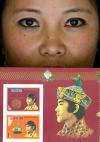 Una niña de Bhutan sostiene la portada de la primera edición de una estampilla postal, que muestra al rey King Jigme Singye Wangchuk. Bhutan por primera vez en su historia puede adquirir estampillas postales, ya que éstas sólo podían ser compradas en los mercados internacionales con figuras como Elvis Presley y el Pato Donald.