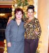Elsa Mena y Susana Russek captadas en un festejo navideño