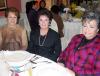 Bety de Aguilera, Paty de Facio y Dora de Perlata, amigas captadas en un festejo social.
