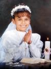 Niña Brenda Paola Soriano Martínez recibió la sagrada eucaristía de la comunión el 14 de febrero de 2004.