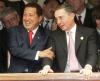 Los presidentes de Argentina, Néstor Kirchner (der) conversa con el de Venezuela Hugo Chávez (c) y de Brasil, Luiz Inacio Lula da Silva (izq), durante la toma de posesión.