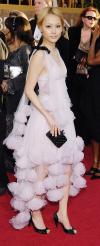 Rinko Kikuchi lució un vestido color  rosa palo.