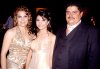 12062007
Jéssica Garza Zamonsett, en su fiesta de cumpleaños acompañada de  sus padres, Jesús Garza y Virginia Zamonsett de Garza.