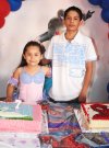 03082007
Ana Isabel y Sergio festejaron siete y 12 años de edad con un convivio organizado por sus padres.