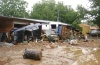 Los mayores destrozos fueron causados por el arroyo “Las Tinajas”, que cruza por zonas habitacionales de Parral, destruyendo casas en colonias, por lo que al menos 20 residentes se encuentran en calidad de desaparecidos.