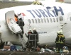 El avión se quebró en tres partes al caer.
