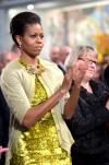 Michelle, esposa del presidente estadounidense, Barack Obama, aplaude a su marido durante la ceremonia.