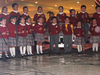 15122009 Alumnos del colegio Los Ángeles portaron gorritos navideños al interpretar los villancicos. EL SIGLO DE TORREÓN / JESÚS GALINDO