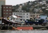 Vista general de un barco varado tras haber sido arrastrado por un terremoto en el puerto de Talcahuano, 531 kilómetros al sur de Santiago Chile.